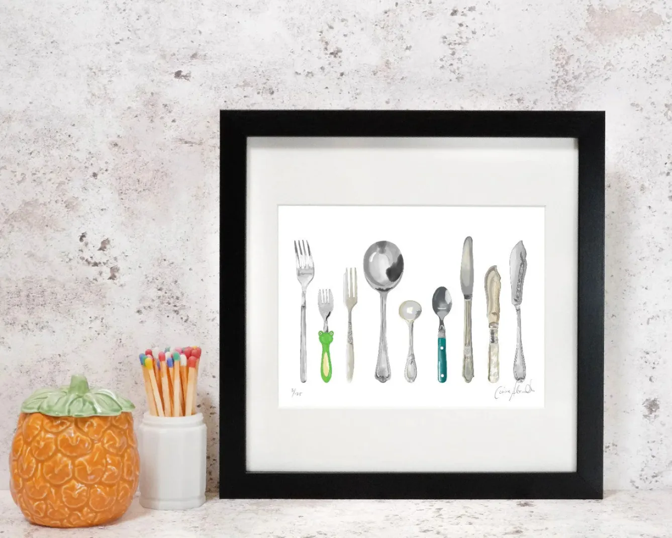 Corinne Alexander A Handful of Cutlery Framed Print by- Art