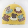 Poppy Treffry Mustard Teacups Tea Cosy- Storage