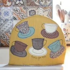 Poppy Treffry Mustard Teacups Tea Cosy- Storage